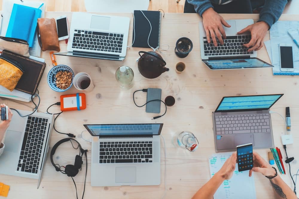 Business owners working together around a table
