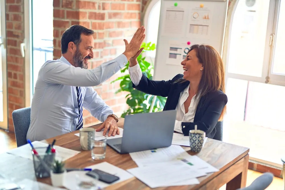 Ascentix team members collaborating